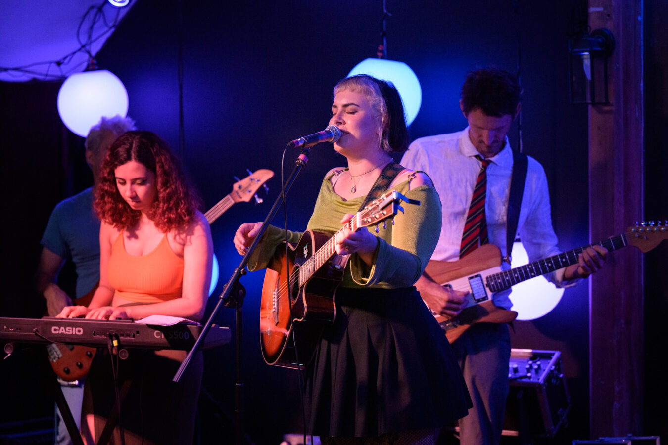 Magic Lantern Band performing on the bar stage.