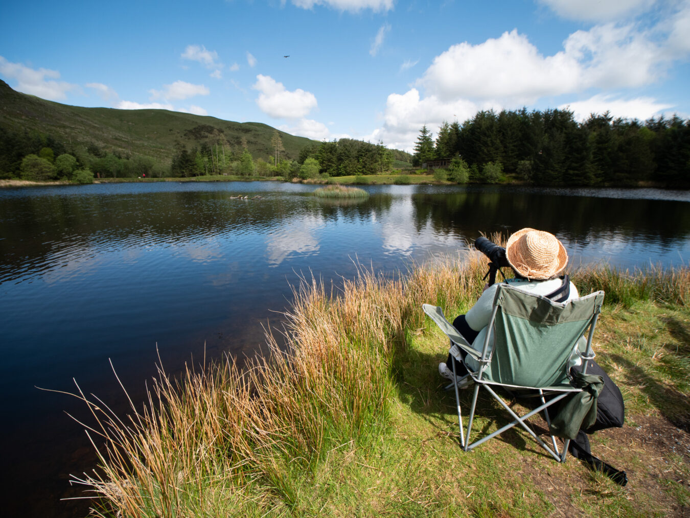 Photographer waiting for the feeding to start in Bwlch nant Yr Arian