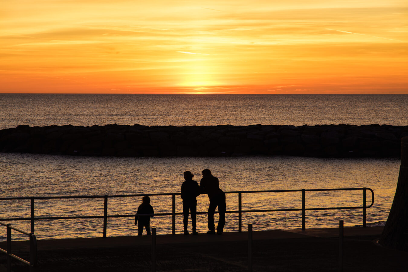 Family enjoying the sunset in Tywyn