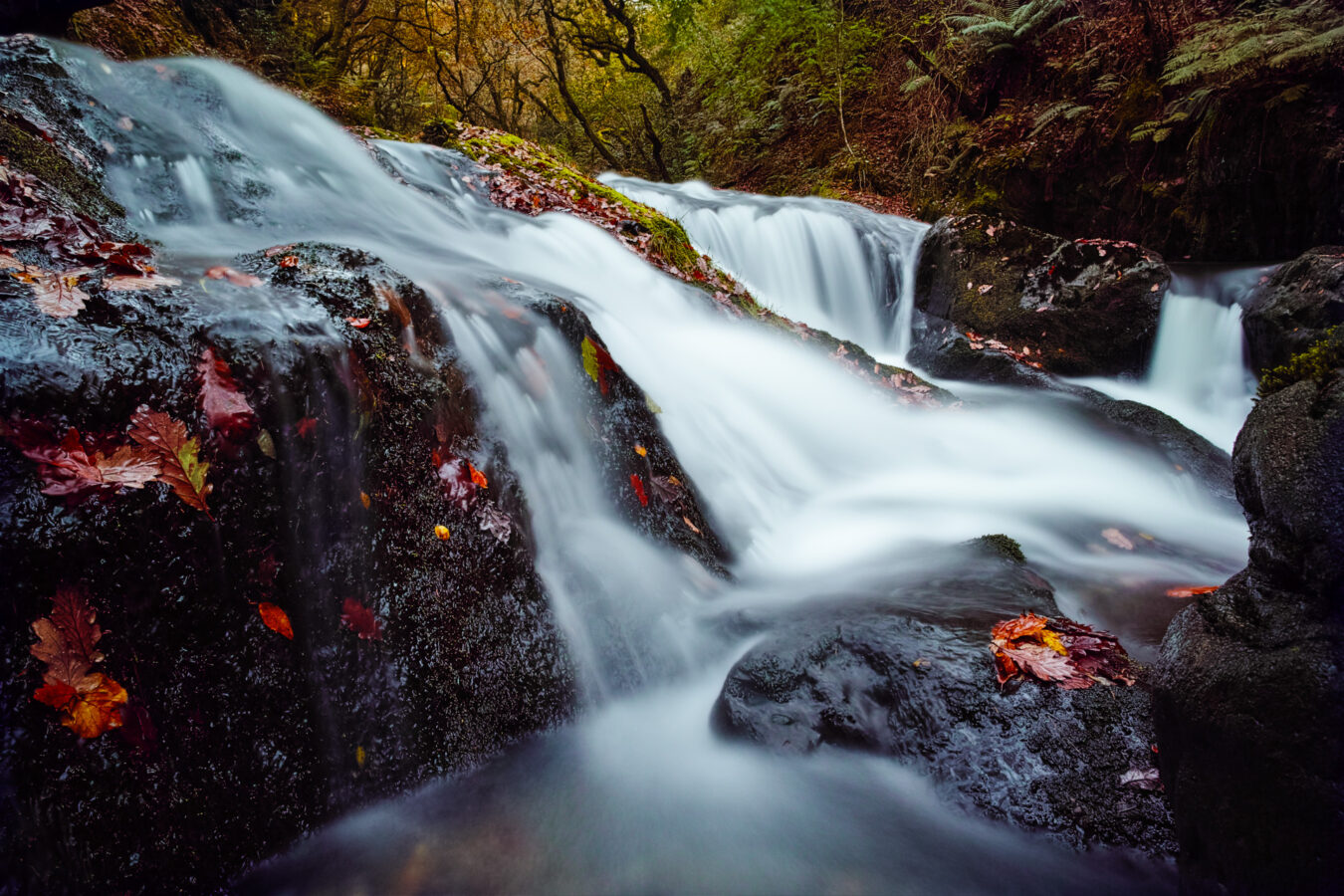 Long exposure waterfalls in Nant Gwernol in Autumn.