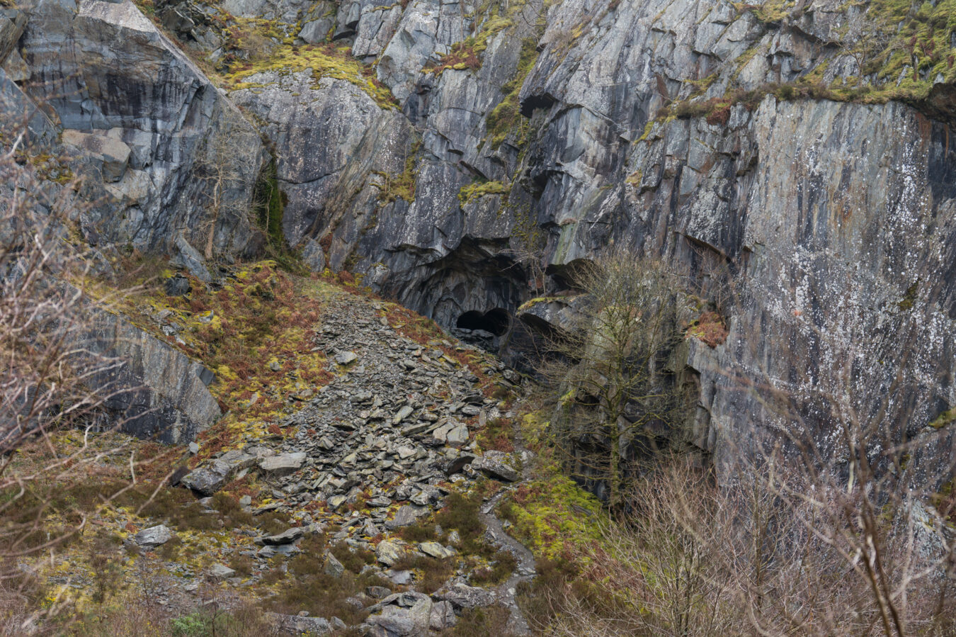 Quarry with binocular tunnels visible in the distance