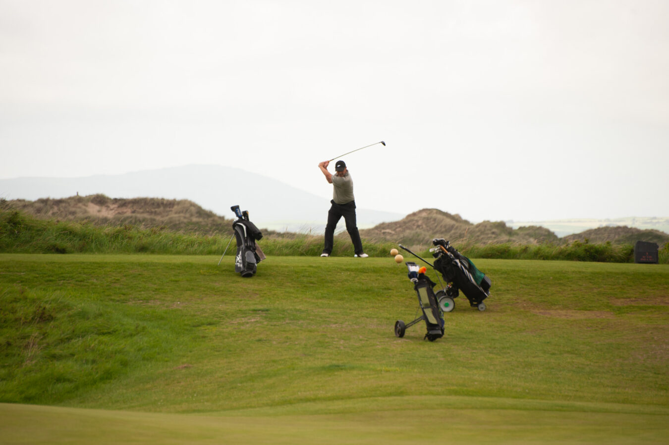 Golf players in Harlech