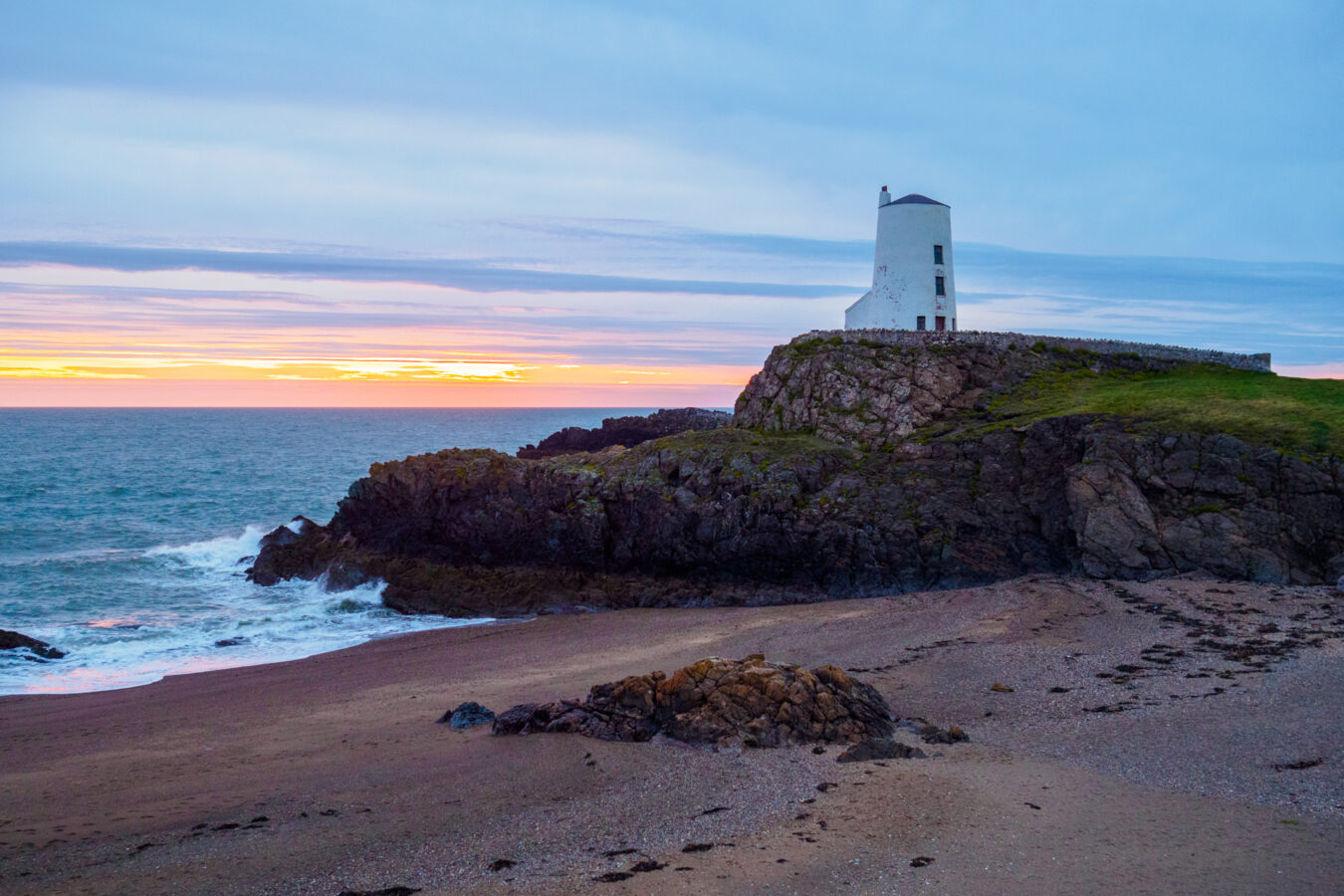 Twr Mawr lighthouse on Ynys Llanddwyn at sunset