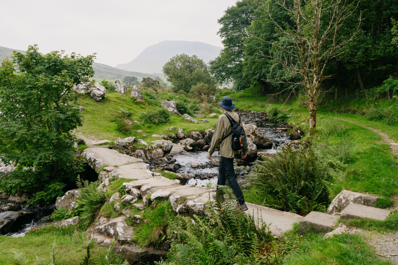 Walking on the stone footbridge