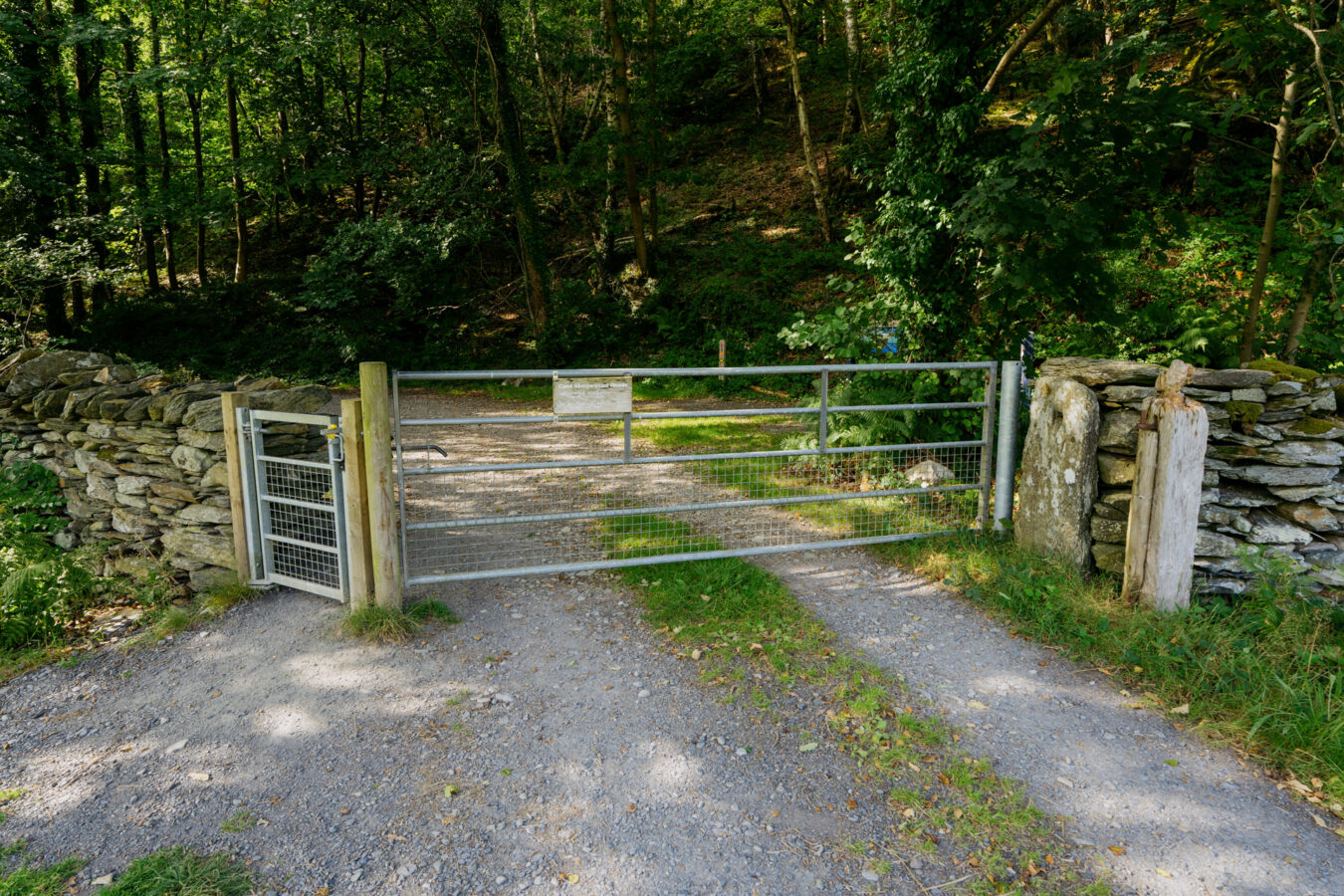 Farm gate at the entrance of the Abergwynant Woods