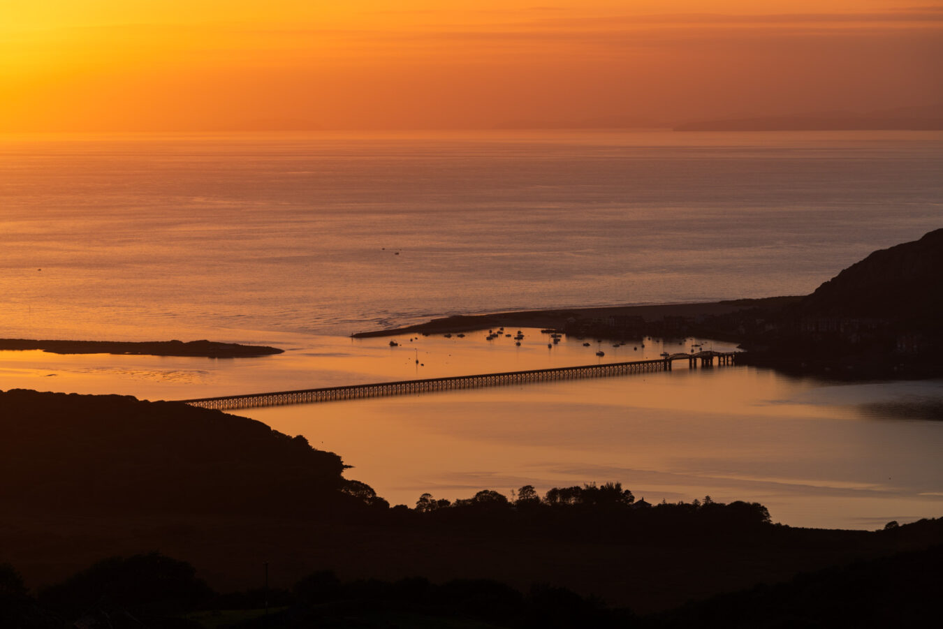 Barmouth bridge silhouette at sunset