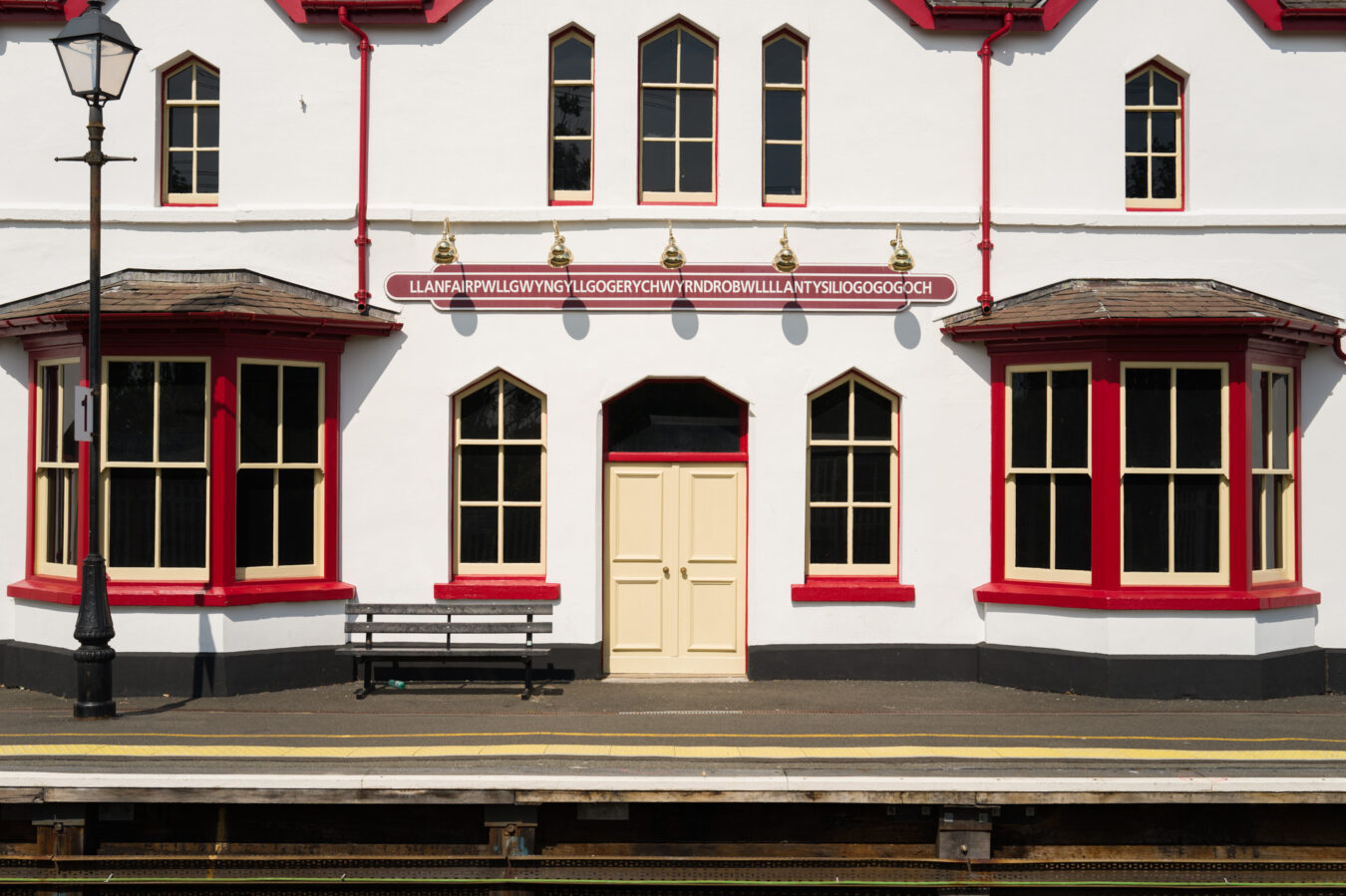 Llanfairpwllgwyngyllgogerychwyrndrobwllllantysiliogogogoch sign at the train station
