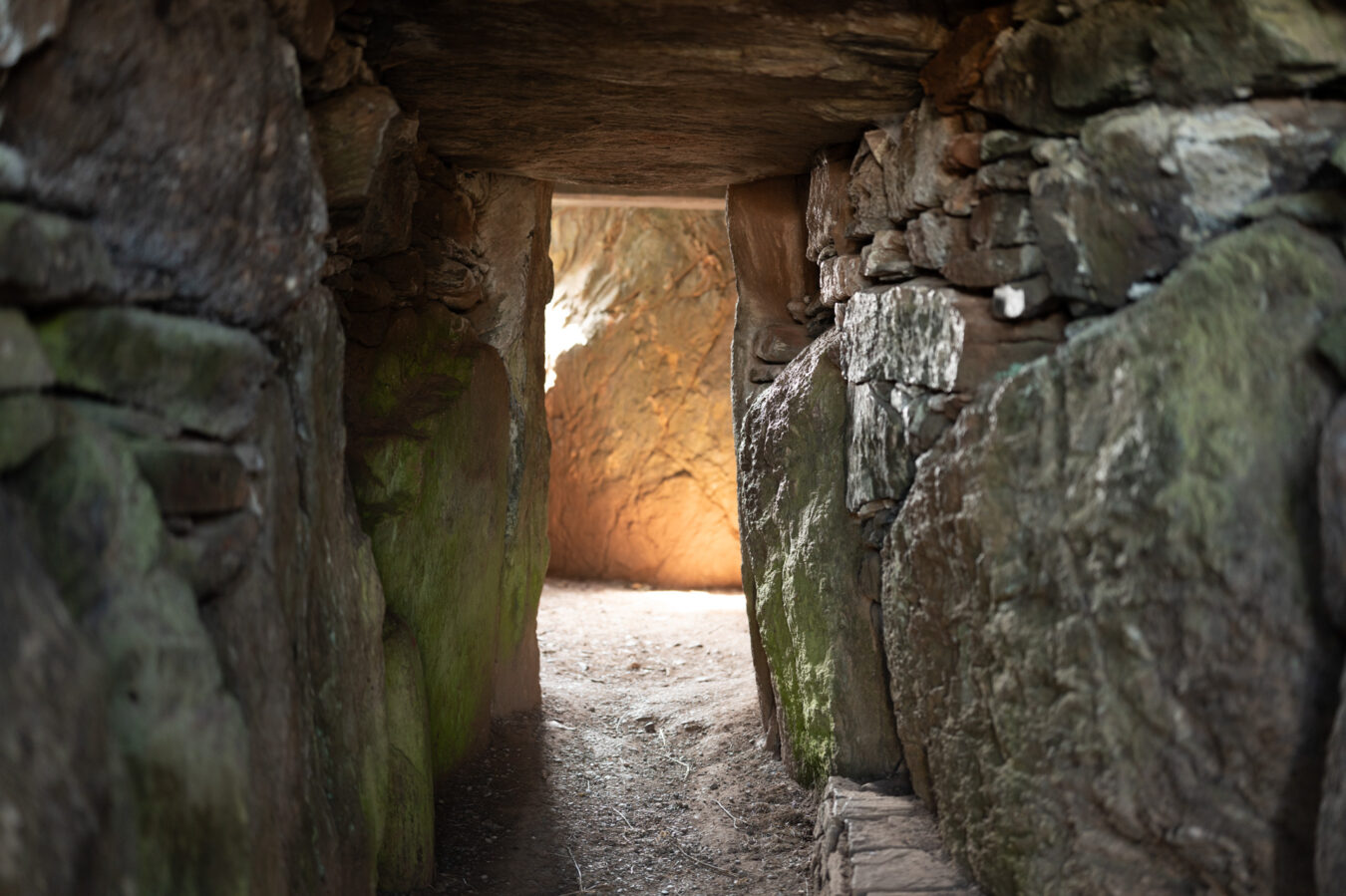 Narrow corridor inside the Bryn Celli Ddu chambered tomb