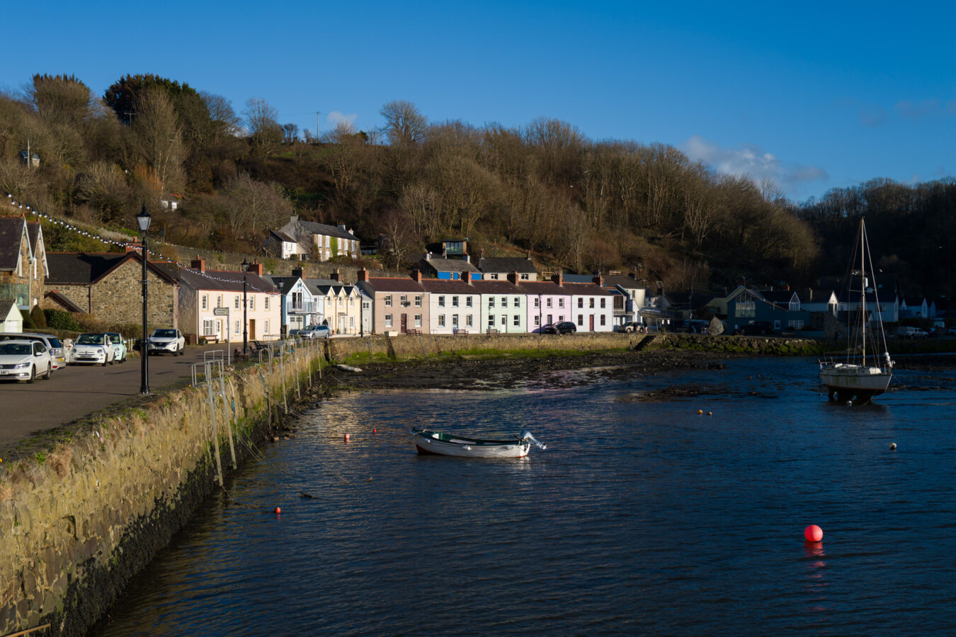 Coloured cottages along Fishguard Harbour