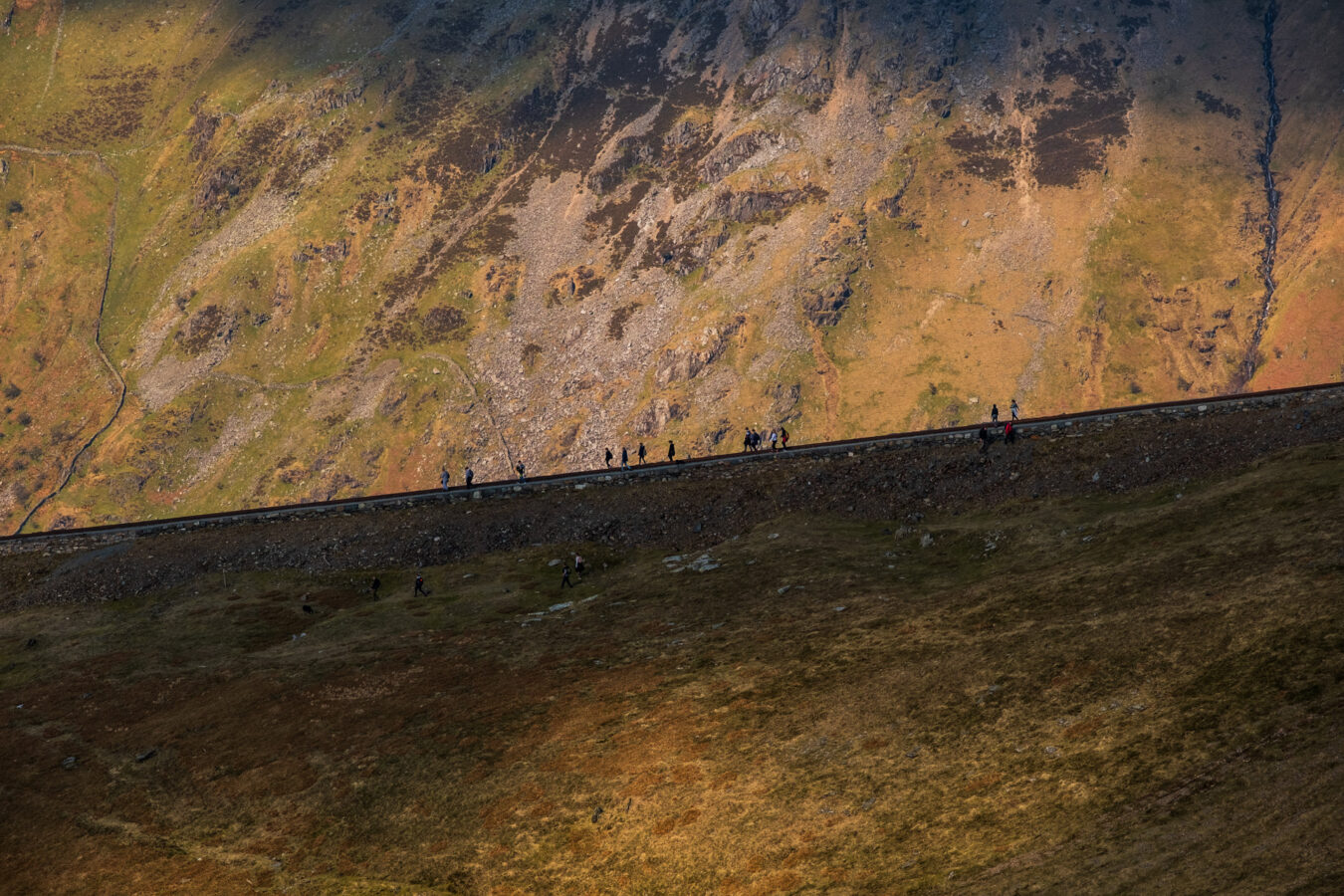 Hikers walking up in the distance